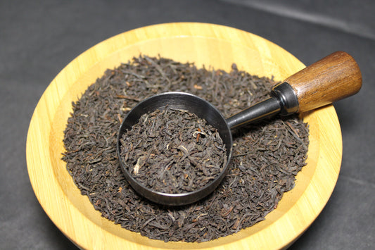La cuillère Noir Cap sur le thé