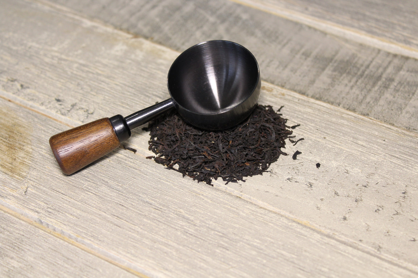 La cuillère Noir Cap sur le thé