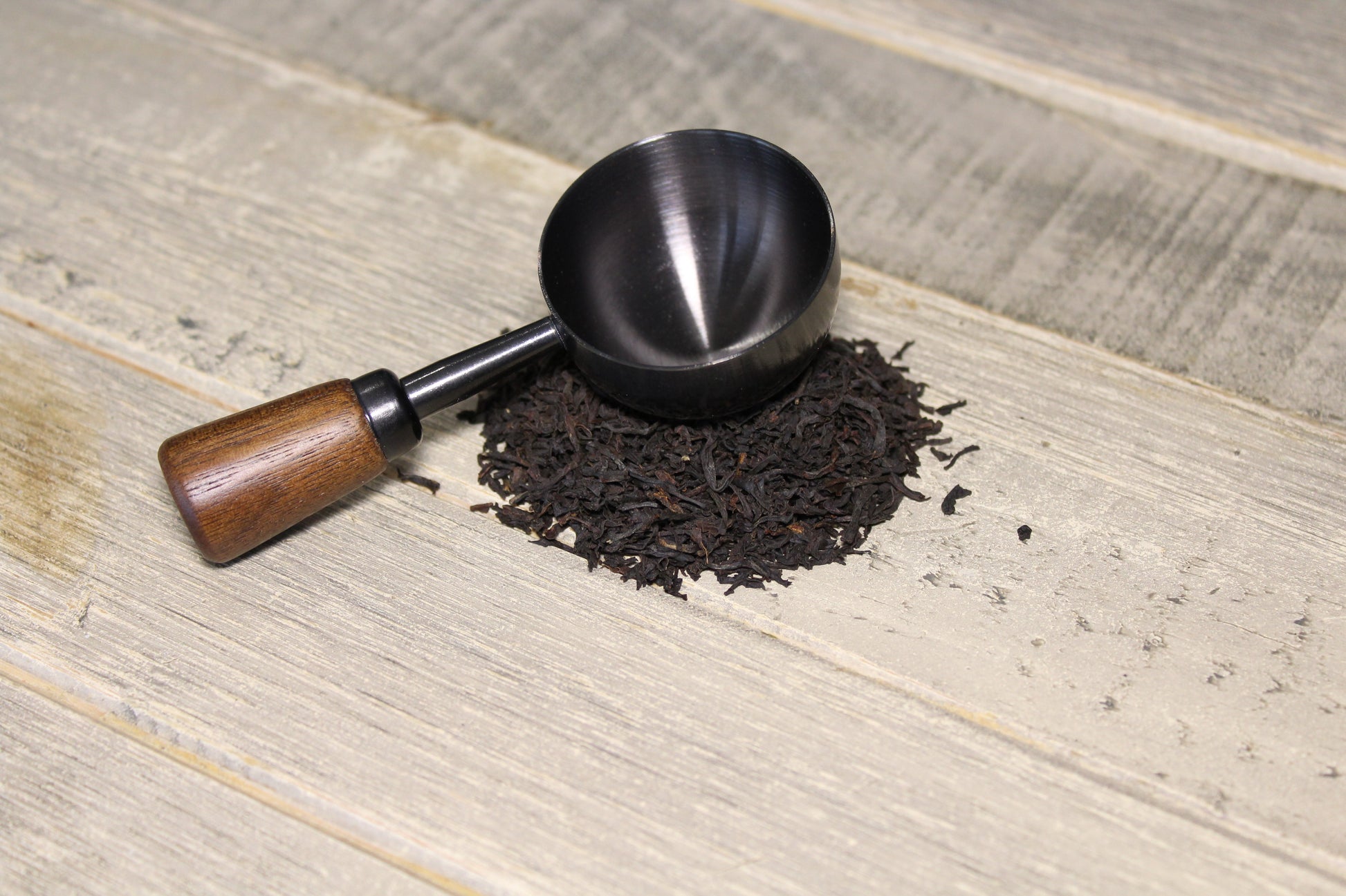 La cuillère Noir Cap sur le thé