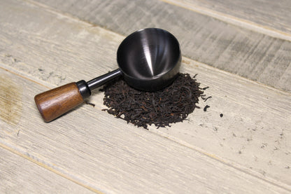 La cuillère Noir Cap sur le thé